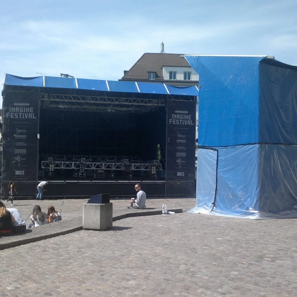 The stage in the background of the square makes you imagine a big party.
