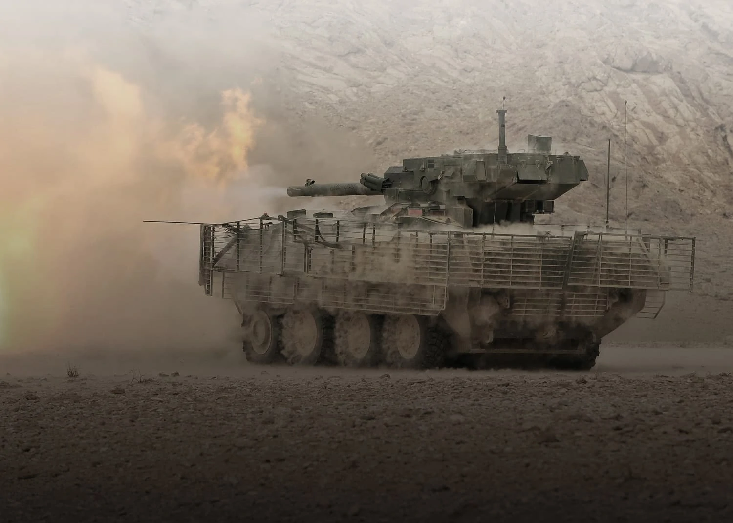 tank firing a volley in the dust