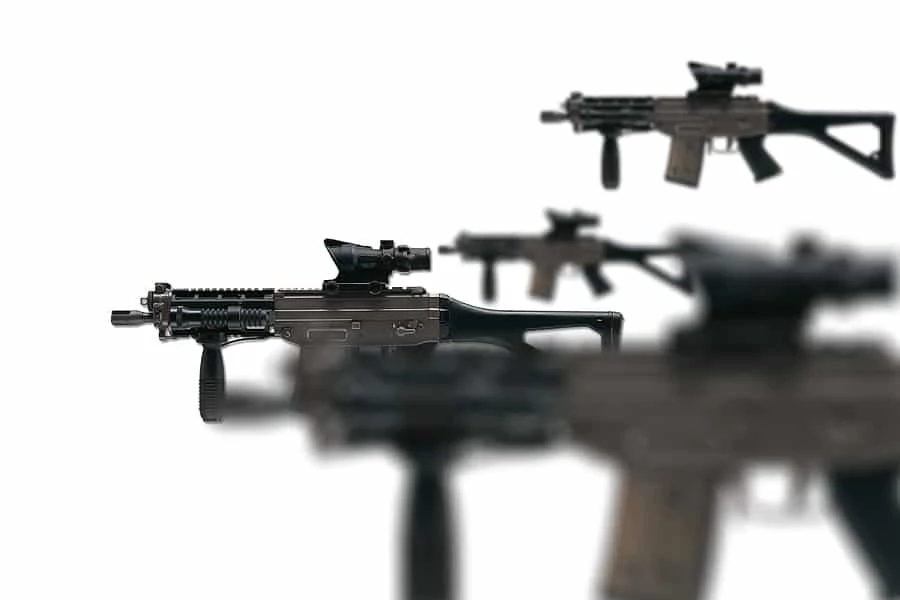 Several SIG 551 rifles on a white background.