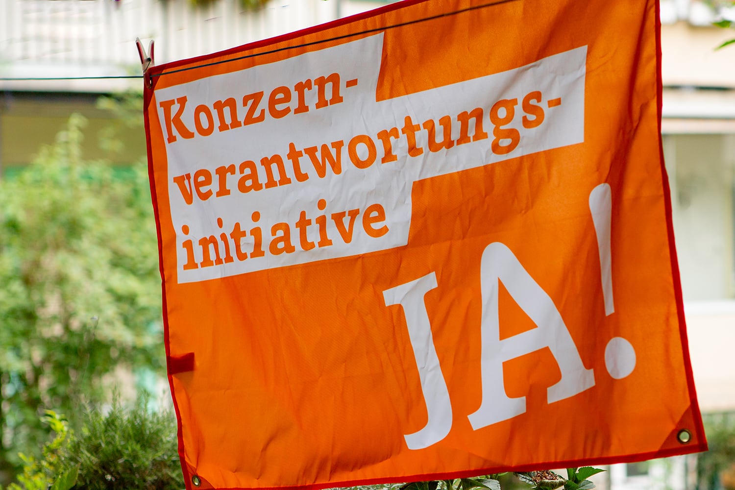 Orange KVI flag on a clothesline